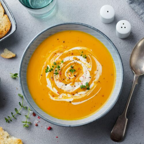 Cream of butternut soup with goat cheese